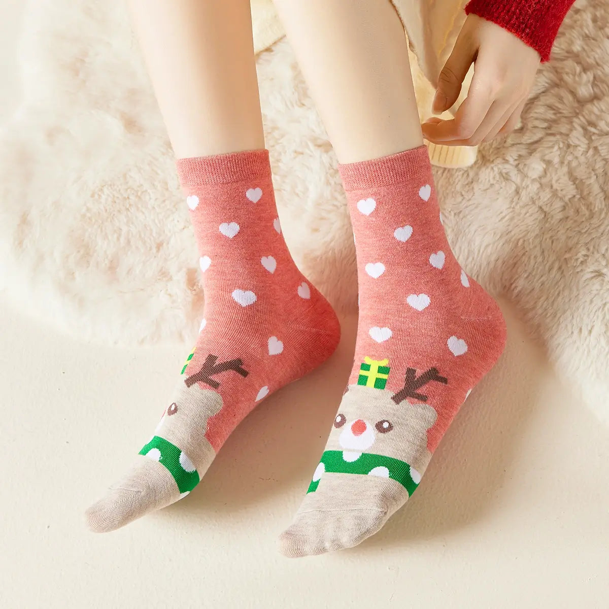 Chaussettes hautes de Noël, motif Renne de Noël et petits coeur, fond rose