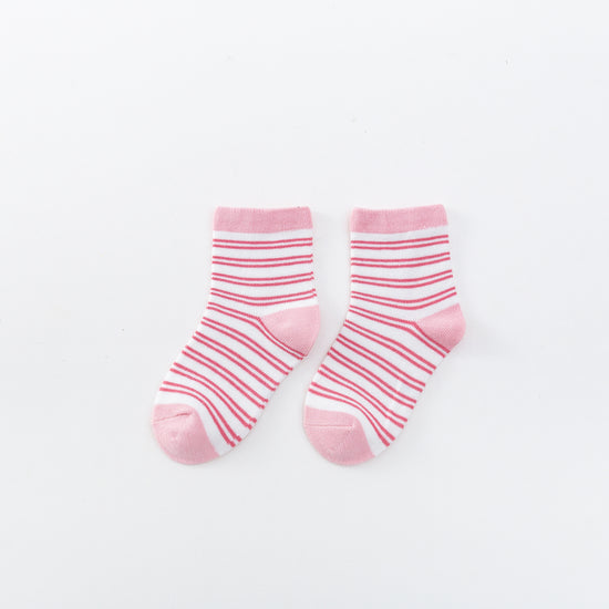 Chaussettes montantes, fond blanc, motifs rayures roses. Pour bébé et enfant (du 12 mois au 12 ans).