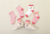 Lot de 5 chaussettes montantes, fond rose ou blanc, motifs variés : rayures, licornes, coeurs. Pour bébé et enfant (du 12 mois au 12 ans).