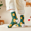 Chaussettes hautes de Noël avec motif biscuit. Douces, chaudes et stylées pour un hiver cosy et un look joyeux à Noël.