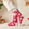 Chaussettes hautes de Noël avec motif flocon. Douces, chaudes et stylées pour un hiver cosy et un look joyeux à Noël.