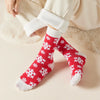 Chaussettes hautes de Noël avec motif flocon. Douces, chaudes et stylées pour un hiver cosy et un look joyeux à Noël.