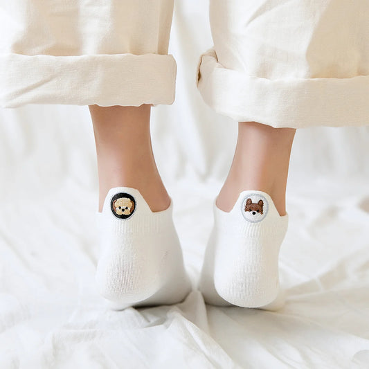 Chaussettes blanches au motif chiens dépareillés sur la languette