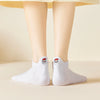 Chaussettes blanches motif de noël, languette brodée : Père Noël, bonhomme de neige, flocon, sapin