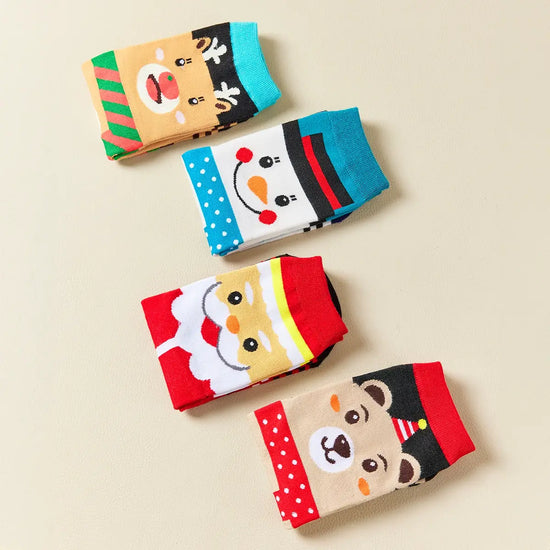 Coffret de 4 chaussettes hautes costume de Noël : Père Noël, Bonhomme de Neige, Renne et Ours