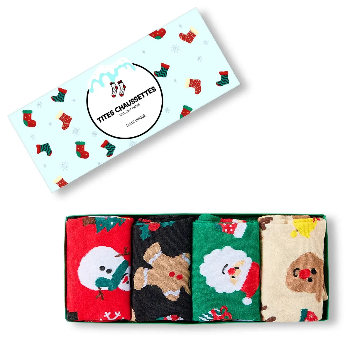 Chaussettes hautes, motifs de Noël : bonhomme de neige, père noël, renne ou biscuit de noël. Coloris festifs : rouge, vert, beige, noir. Douces et Chaudes. Vendues dans leur coffret de Noël.