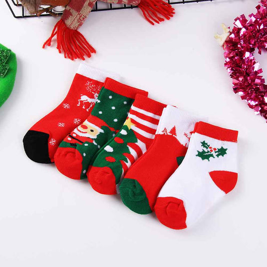 Lot de 5 chaussettes de Noël pour enfants. Coloris rouge, blanc et vert. Idéales pour les fêtes. Pour bébés et enfants (du 12 mois au 12 ans).