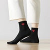 Chaussettes longues noir adultes en coton avec un cœur sur le côté | Chaussettes abordables et de haute qualité | Un excellent choix pour les adultes qui aiment les cœurs |