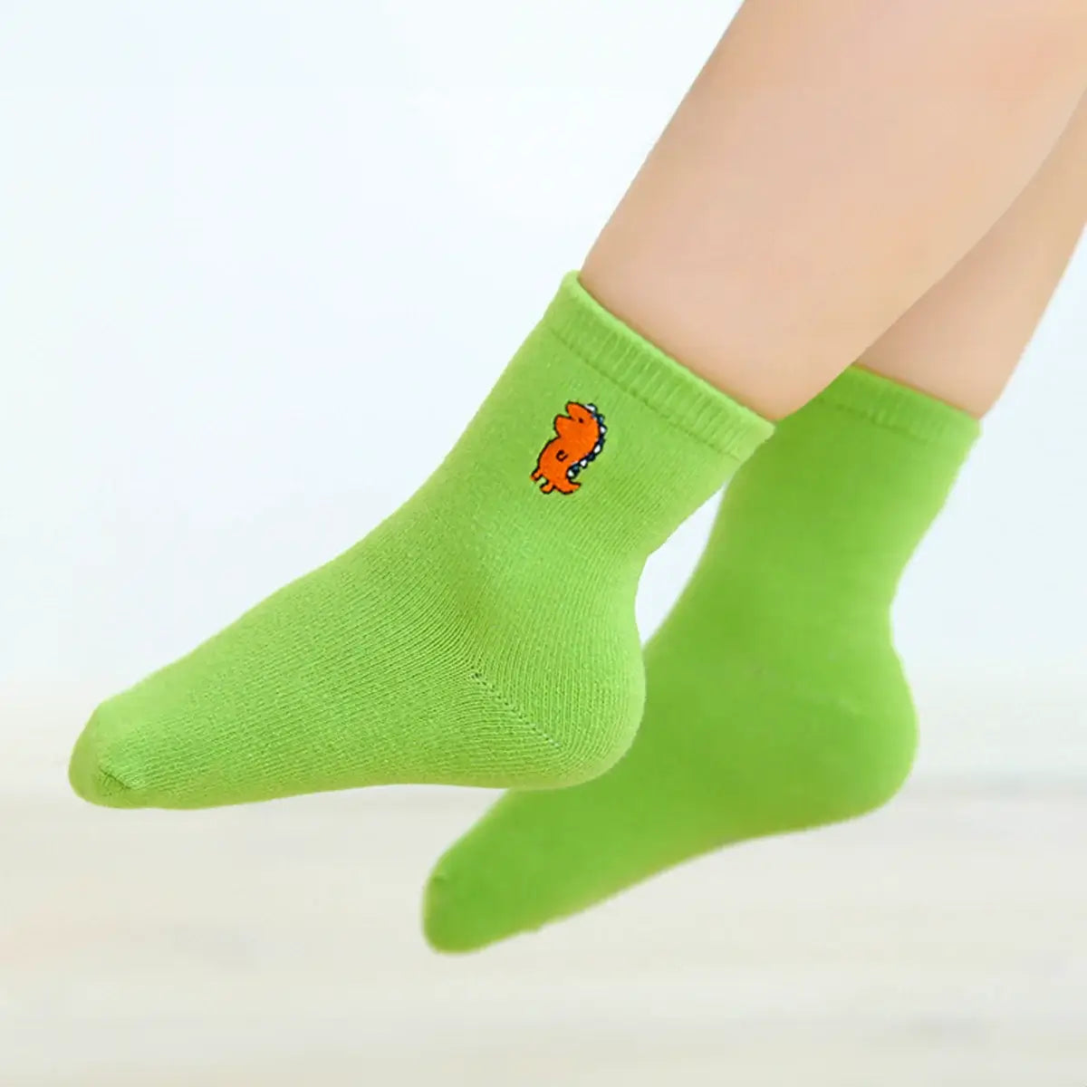 Chaussettes verte longues en coton à motif dinosaure pour enfants | Chaussettes douces et confortables | Disponibles en différentes tailles et couleurs | Un cadeau parfait pour les enfants de tous âges