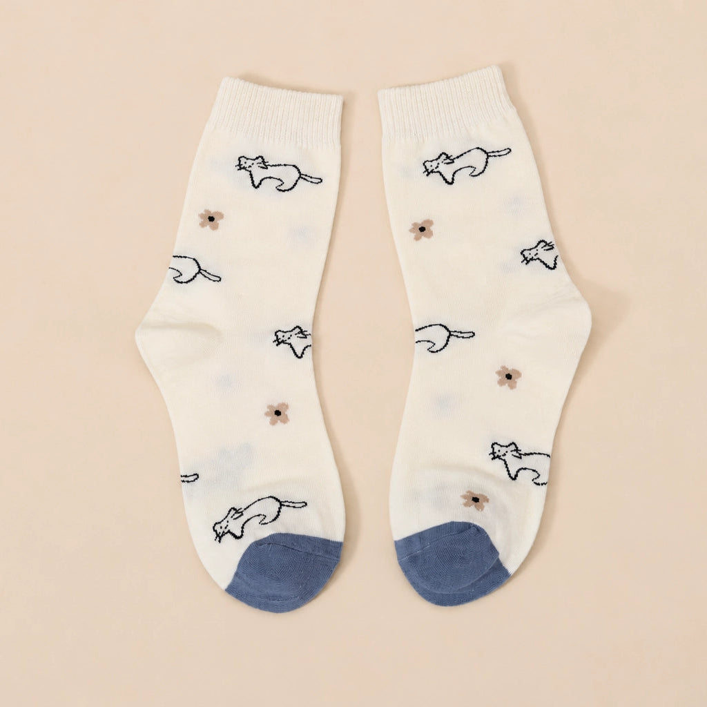 Chaussettes hautes chiens et chats pour femme, vendues à l’unité. Deux motifs animaliers originaux, matière douce et stretch, taille unique 35-41.