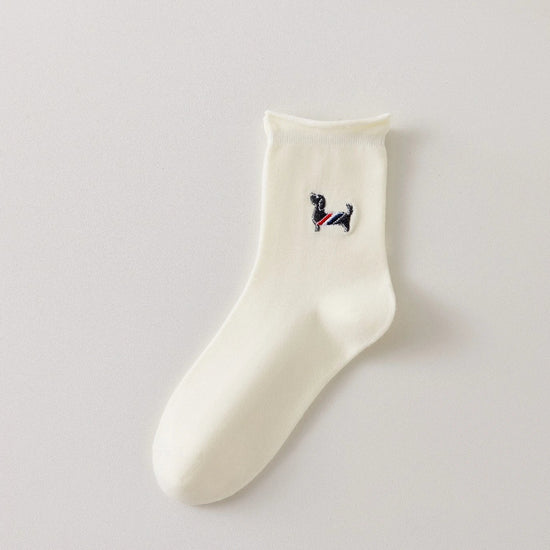 Chaussette femme crème vendue à l’unité avec broderie chien ou chat. Maille douce, bord roulotté et taille unique 35-41. Confort et fantaisie garantis.