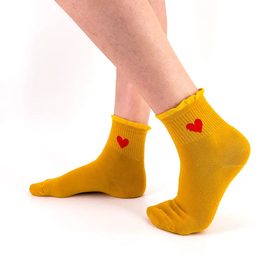 Chaussette haute avec cœur brodé et bord volanté dentelle