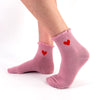 Chaussette haute avec cœur brodé et bord volanté dentelle