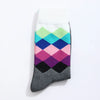 Chaussettes hautes pour homme. Motif losange. Version grise et version bleu. Dégradé de couleurs sur les motifs losange. 