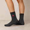 Chaussettes hautes noir fil lurex argenté, coeur brodé rouge 