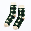 Chaussettes hautes pour homme. Motif rosace vert, noir et blanc. 