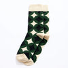 Chaussettes hautes pour homme. Motif rosace vert, noir et blanc. 
