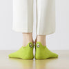 Chaussettes languette vertes, motif avocat brodé sur la languette 