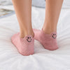 Chaussettes en coton à languette sourire à motif smiley pour femme 