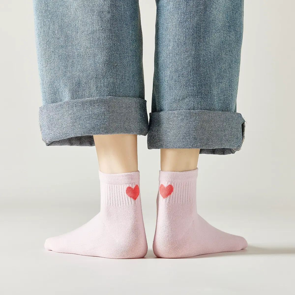 Chaussette mi-haute avec cœur rouge au talon