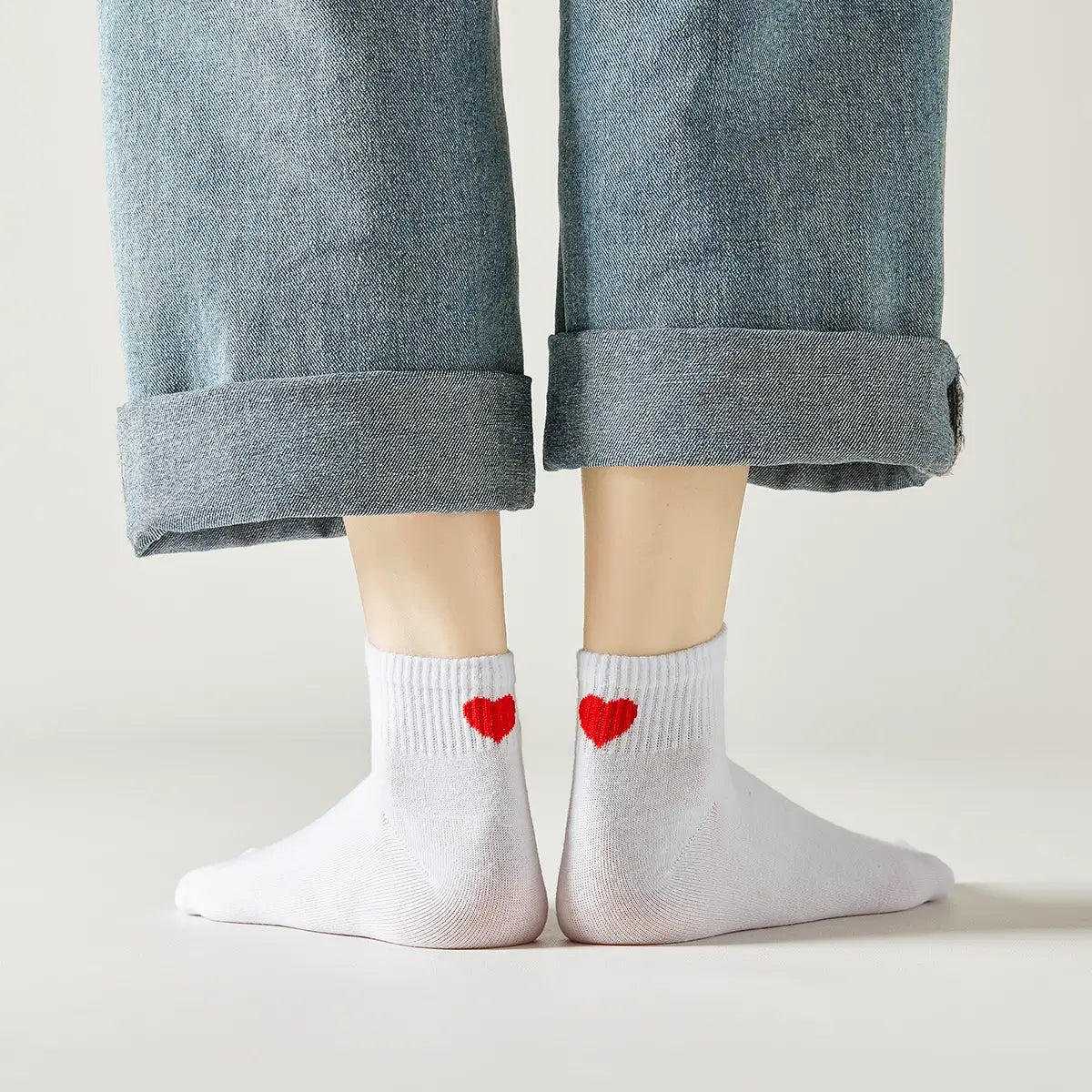 Chaussette mi-haute avec cœur rouge au talon