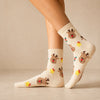 Chaussettes hautes, motif renne. Coloris beige festif. Douces et Chaudes. Également vendues en lot de 4. Idéales pour offrir. 
