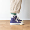 Chaussettes blanches femme à rayures et cœur, vendues à l’unité en noir ou vert. Douces et stretch, taille 35-41, pour un look sportif et tendance.