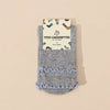 Chaussettes hautes chinées à double feston vendues à l’unité en bleu, gris ou beige. Matière douce et stretch, taille 35-41, pour un style féminin.