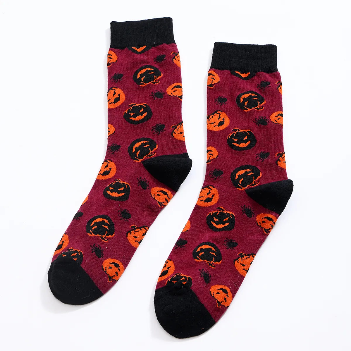 Chaussettes hautes homme Halloween taille 38-45. Confortables et extensibles, avec motifs citrouilles et araignées. Style festif garanti.