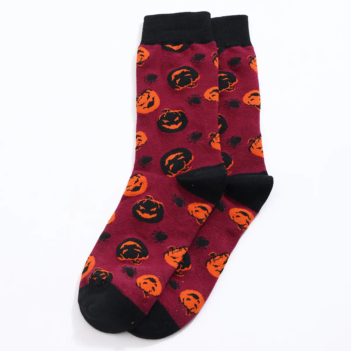Chaussettes hautes homme Halloween taille 38-45. Confortables et extensibles, avec motifs citrouilles et araignées. Style festif garanti.
