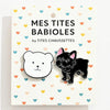 Lot de 2 pin's bulldog noir et tête d'ours blanc.