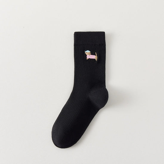 Lot de 3 chaussettes hautes côtelées. Coloris noir, gris chiné, blanc. Broderie petit chien sur l'extérieur du pied. 