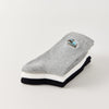 Lot de 3 chaussettes hautes côtelées. Coloris noir, gris chiné, blanc. Broderie petit chien sur l'extérieur du pied. 