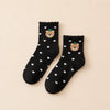 Lot de 4 chaussettes de noël, personnages de noël (père noël, cerf, bonhomme de neige, ourson), motif petits coeurs, finition feston