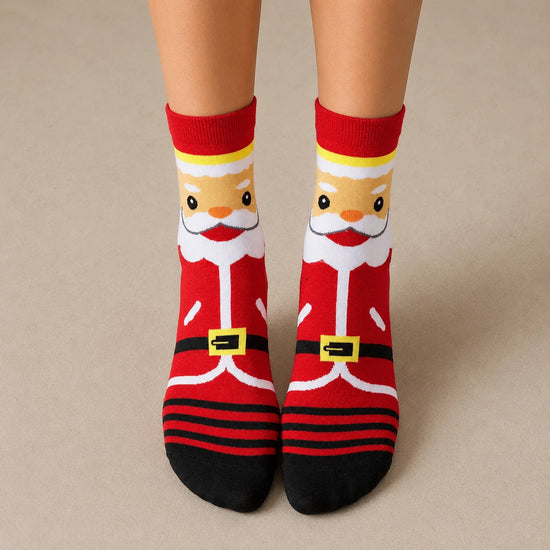 Coffret de 4 chaussettes hautes costume de Noël : Père Noël, Bonhomme de Neige, Renne et Ours