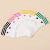Lot de 4 chaussettes blanches femme à rayures et cœur. Quatre coloris, matière douce et stretch, taille unique 35-41, pour un style sportif et coloré