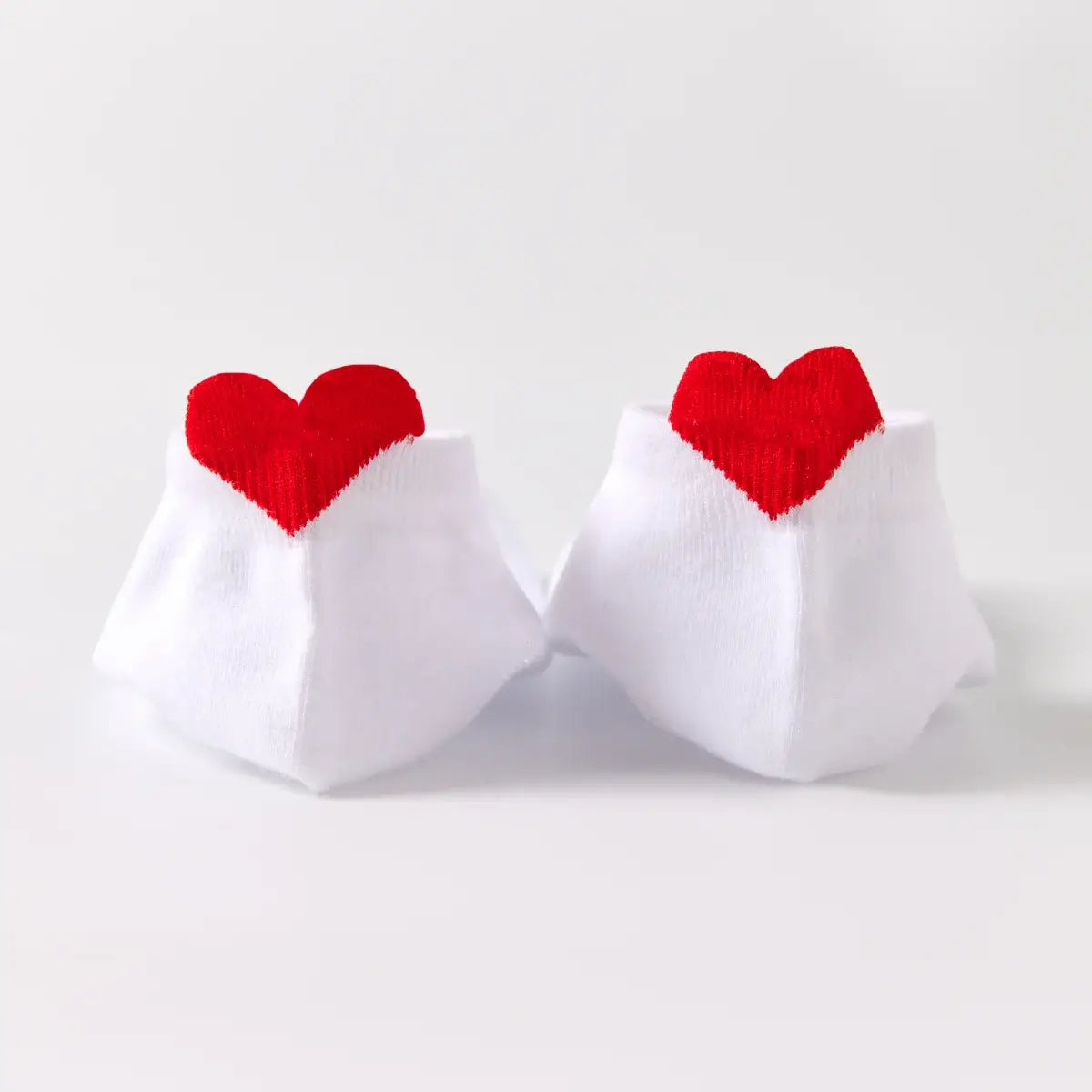 Lot de 5 socquettes unies avec languette cœur brodé.