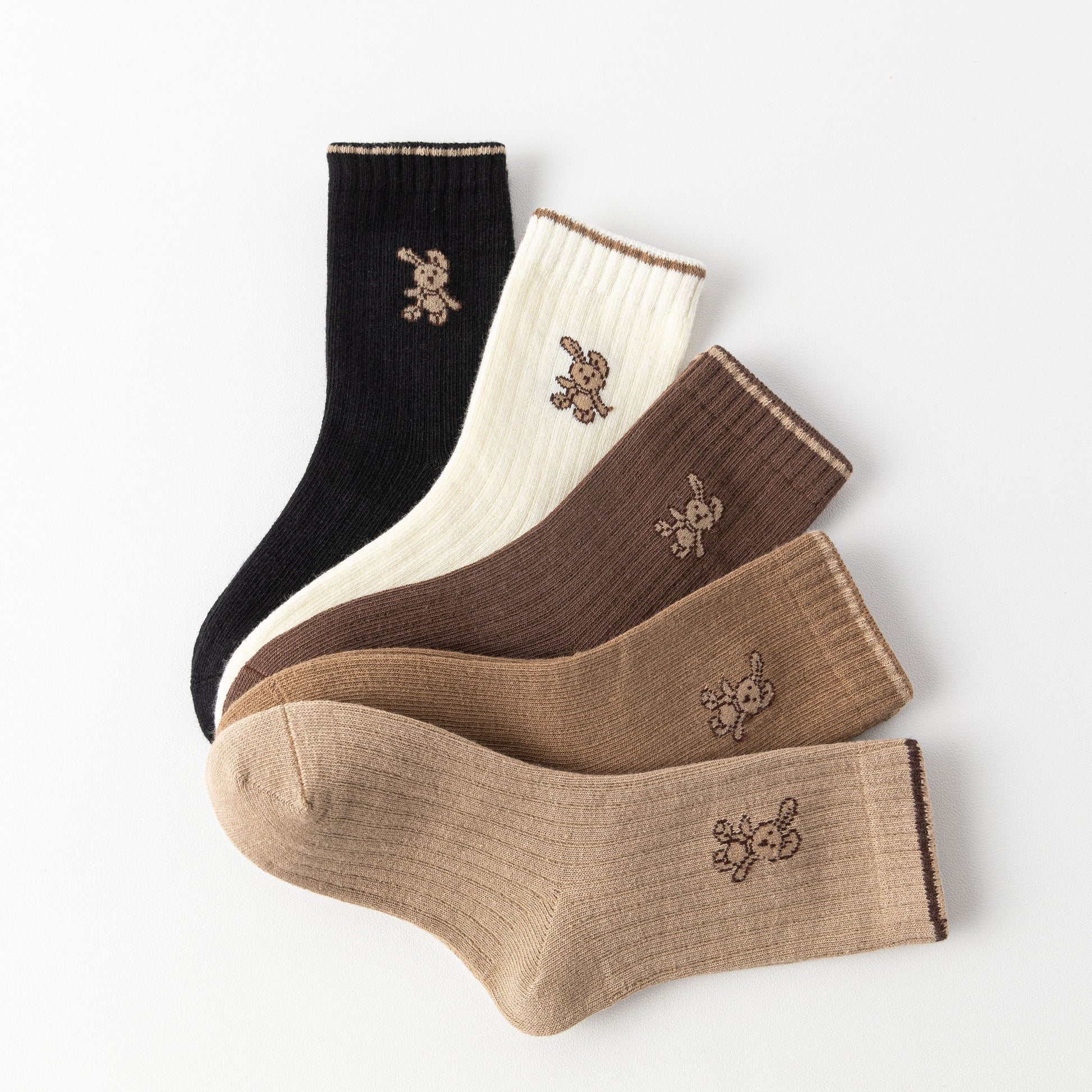 Lot de 5 chaussettes hautes fille avec motif lapin. Douces, chaudes et extensibles, parfaites de 12 mois à 12 ans pour un look mignon et confortable.