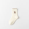 Lot de 5 chaussettes hautes fille avec motif lapin. Douces, chaudes et extensibles, parfaites de 12 mois à 12 ans pour un look mignon et confortable.
