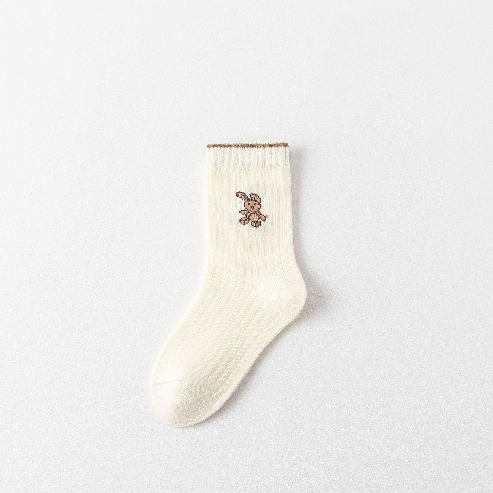Lot de 5 chaussettes hautes fille avec motif lapin. Douces, chaudes et extensibles, parfaites de 12 mois à 12 ans pour un look mignon et confortable.