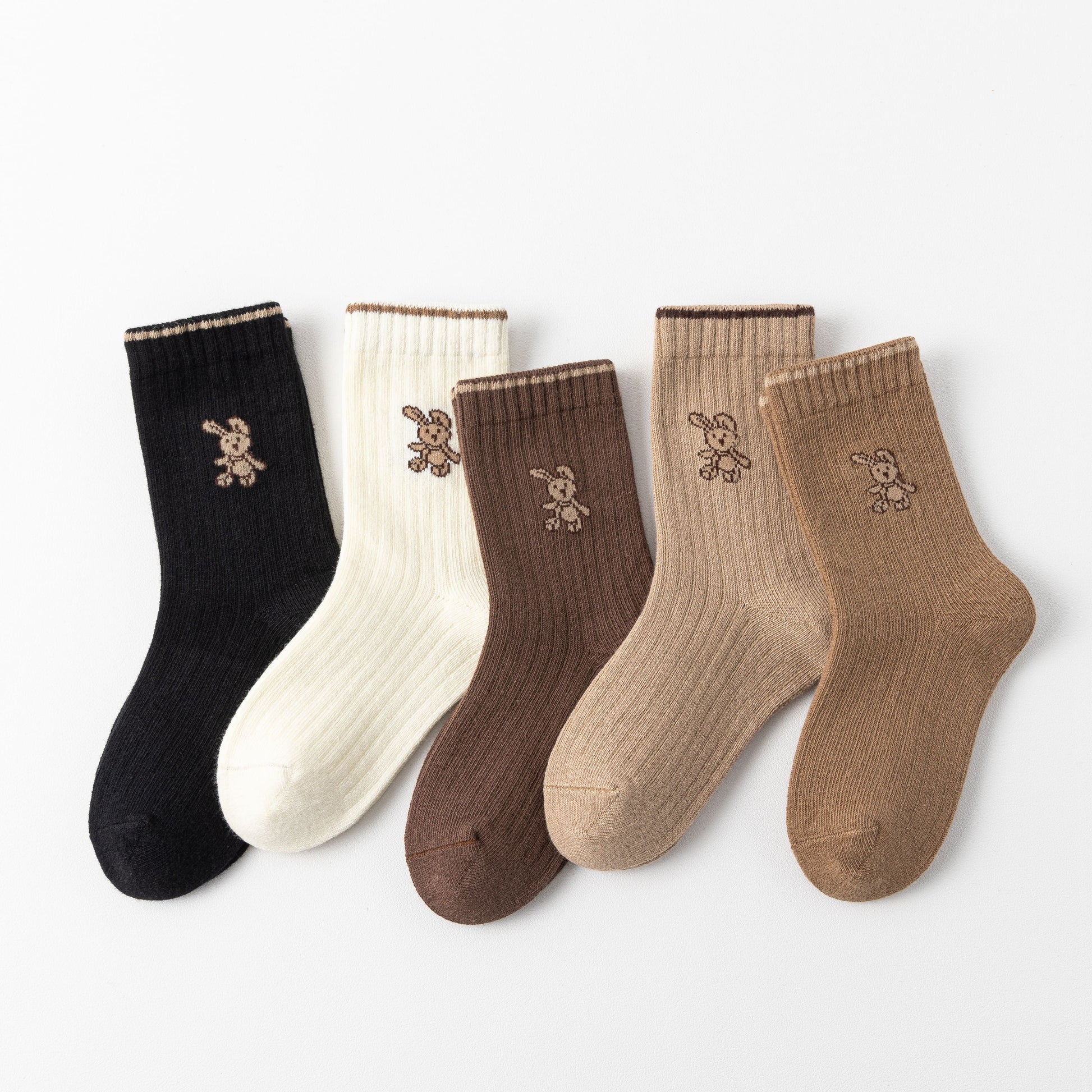 Lot de 5 chaussettes hautes fille avec motif lapin. Douces, chaudes et extensibles, parfaites de 12 mois à 12 ans pour un look mignon et confortable.