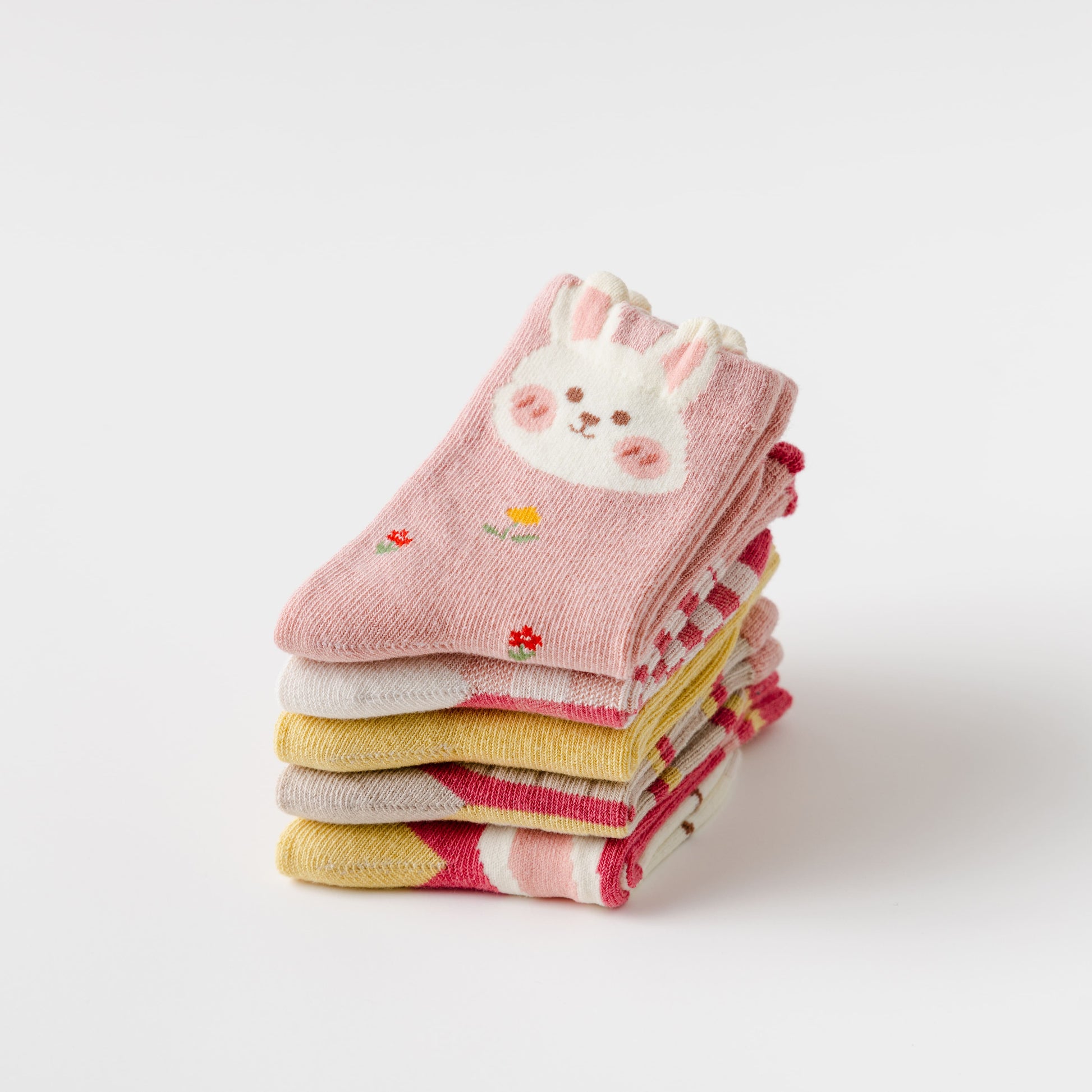 Lot de 5 chaussettes hautes fille avec motifs lapin rose mignons. Parfaites pour l’hiver, elles offrent douceur, chaleur et style dès 12 mois jusqu’à 12 ans.
