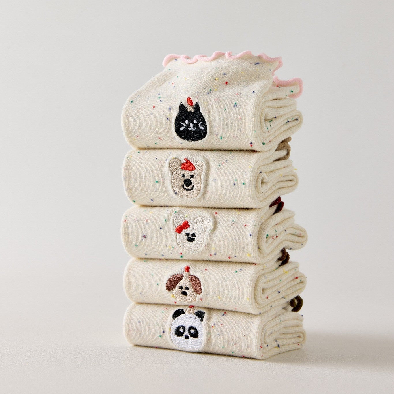 Lot de 5 chaussettes montantes motif animaux avec détail volanté. Coton majoritaire, confortables et festives. Idéales pour un look fun et cosy