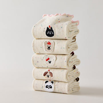 Lot de 5 chaussettes montantes motif animaux avec détail volanté. Coton majoritaire, confortables et festives. Idéales pour un look fun et cosy