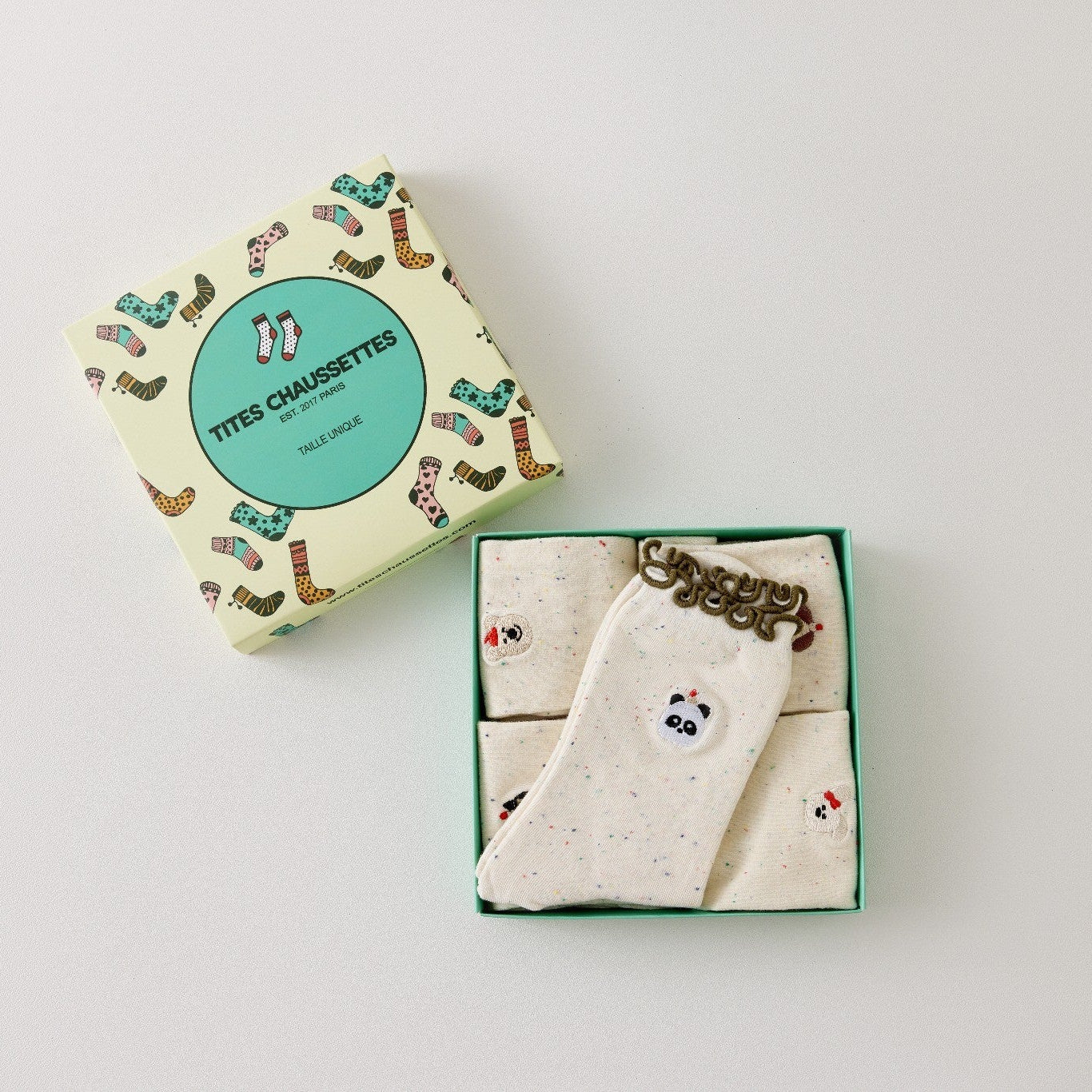 Lot de 5 chaussettes montantes motif animaux avec détail volanté. Coton majoritaire, confortables et festives. Idéales pour un look fun et cosy