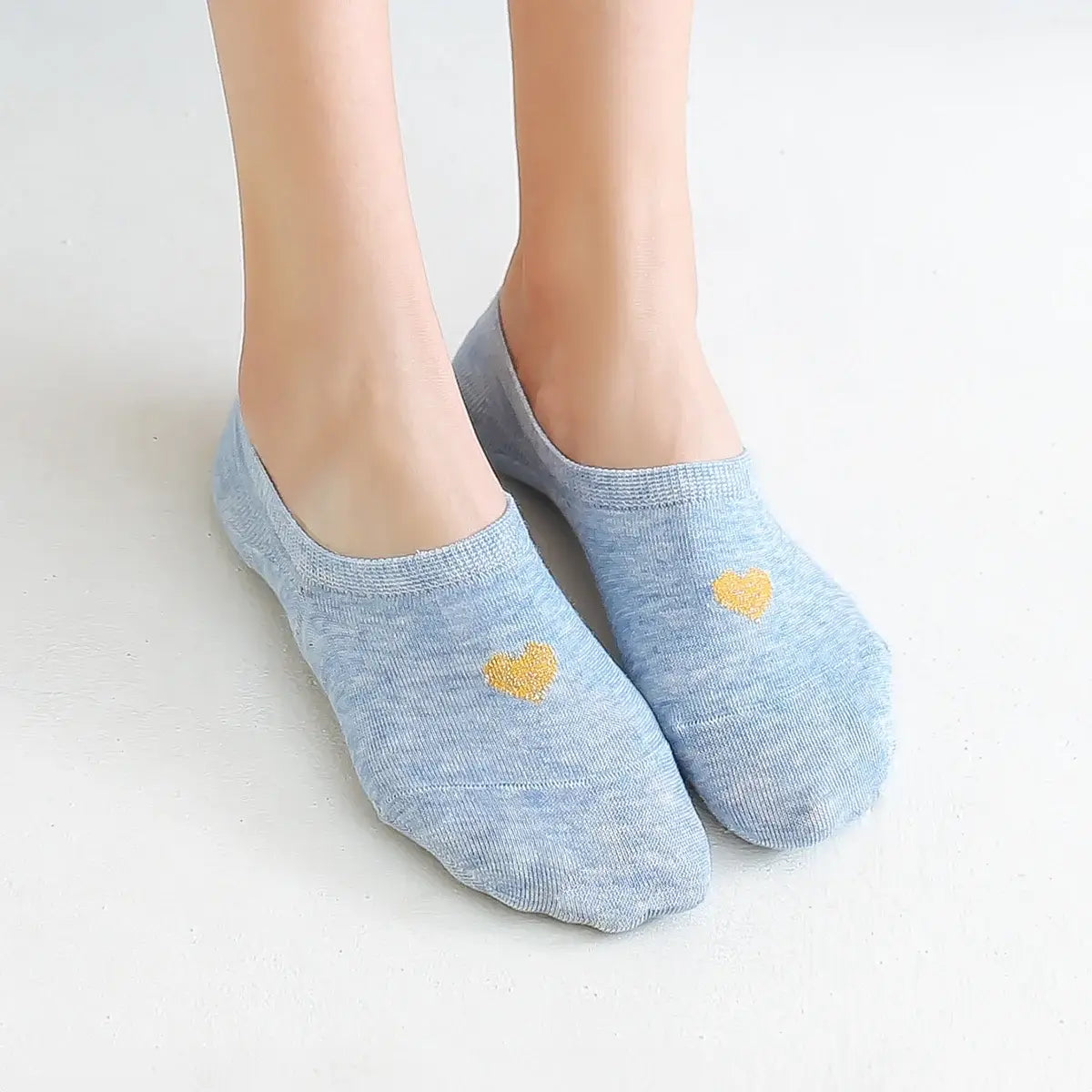 Lot de 5 socquettes invisibles cœur doré. Douces, antiglisse, élégantes. Parfaites pour un look discret, confortable et raffiné durant l’été.