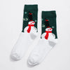 Chaussettes de Noël homme vendues à l’unité. Trois modèles festifs au choix : Père Noël, bonhomme de neige ou rouge décoré. Taille 38-45, confortables.