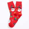 Chaussettes de Noël homme vendues à l’unité. Trois modèles festifs au choix : Père Noël, bonhomme de neige ou rouge décoré. Taille 38-45, confortables.