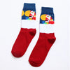 Chaussettes de Noël homme vendues à l’unité. Trois modèles festifs au choix : Père Noël, bonhomme de neige ou rouge décoré. Taille 38-45, confortables.