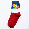 Chaussettes de Noël homme vendues à l’unité. Trois modèles festifs au choix : Père Noël, bonhomme de neige ou rouge décoré. Taille 38-45, confortables.